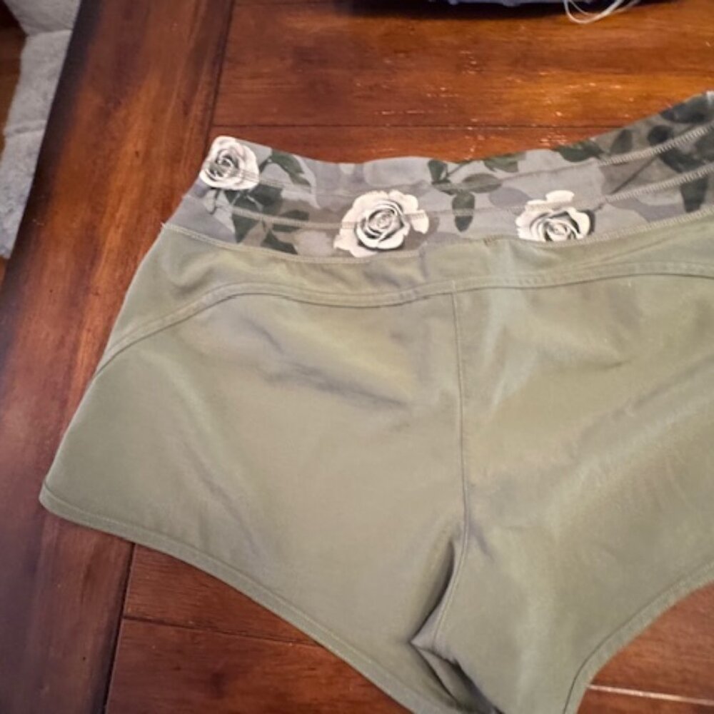 5.11 Gym Shorts. Green with floral waist. Size 6